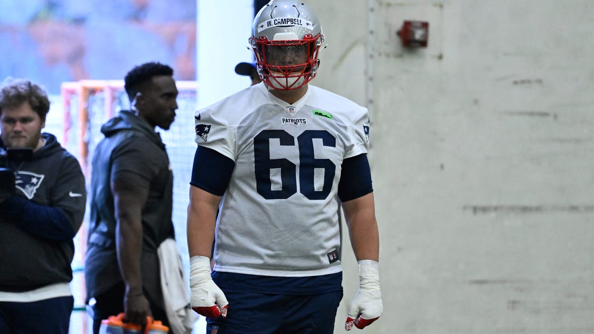 Why haven't the Patriots signed OT Will Campbell yet?