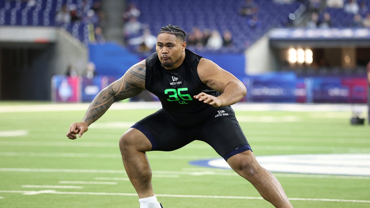 Here's why Dolphins second-round pick Jonah Savaiinaea hasn't signed