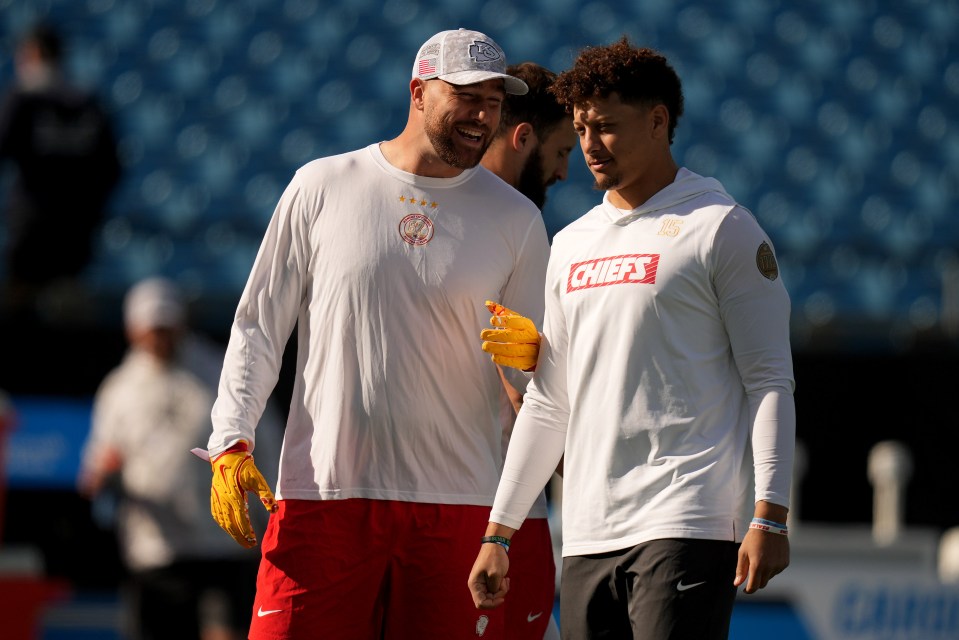 CHARLOTTE, NORTH CAROLINA - NOVEMBER 24: Travis Kelce #87 and Patrick Mahomes #15 of the Kansas City Chiefs warm up at prior to a game against the Carolina Panthers Bank of America Stadium on November 24, 2024 in Charlotte, North Carolina. (Photo by Grant Halverson/Getty Images)
