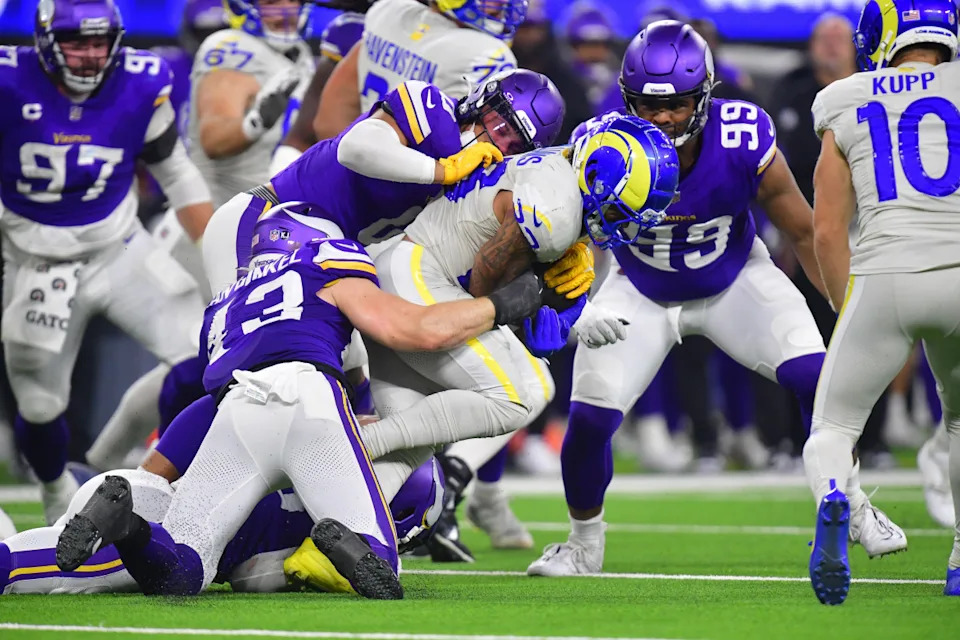 Oct 24, 2024; Inglewood, California, USA; Los Angeles Rams running back Kyren Williams (23) is brought down by Minnesota Vikings linebacker Ivan Pace Jr. (0) and linebacker Andrew Van Ginkel (43) during the first half at SoFi Stadium. Mandatory Credit: Gary A. Vasquez-Imagn Images Gary A&period; Vasquez-Imagn Images