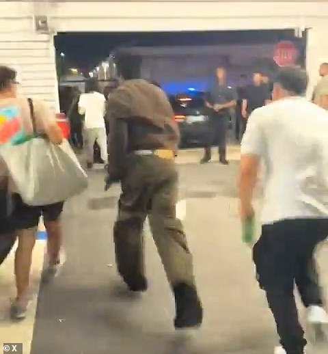 Troubled ex-NFL star Antonio Brown appears to pull out a gun before shots are fired