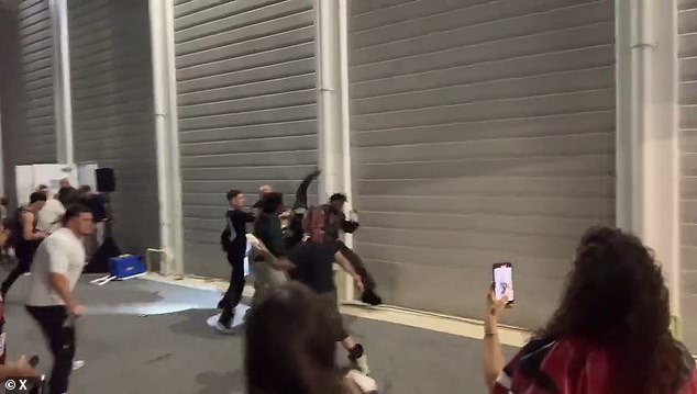 He could be seen brawling with men whom he claimed were attempting to 'steal my jewelry and cause physical harm to me'