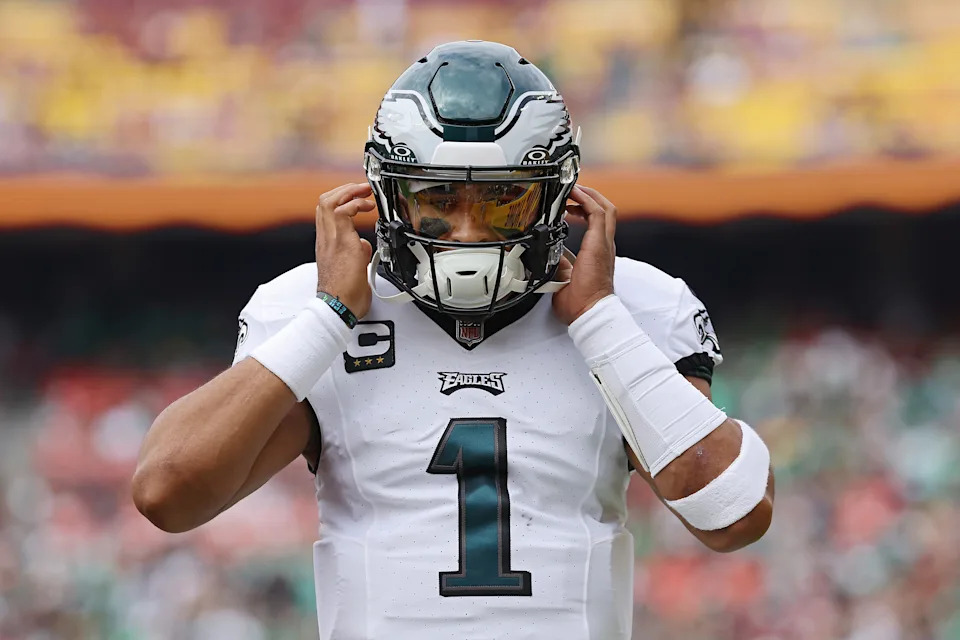 Jalen Hurts #1 of the Philadelphia Eagles looks on during the first quarter against the Washington Commanders at FedExField on October 29, 2023 in Landover, Maryland. (Photo by Patrick Smith/Getty Images)