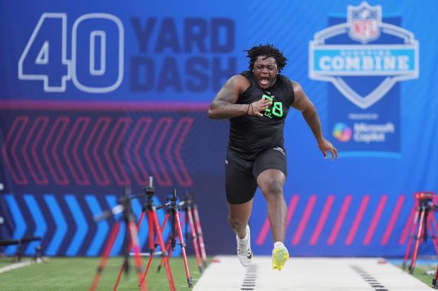 Missouri offensive lineman Armand Membou runs the 40-yard dash at the NFL combine in Indianapolis, on March 2, 2025. (AP Photo/Michael Conroy)