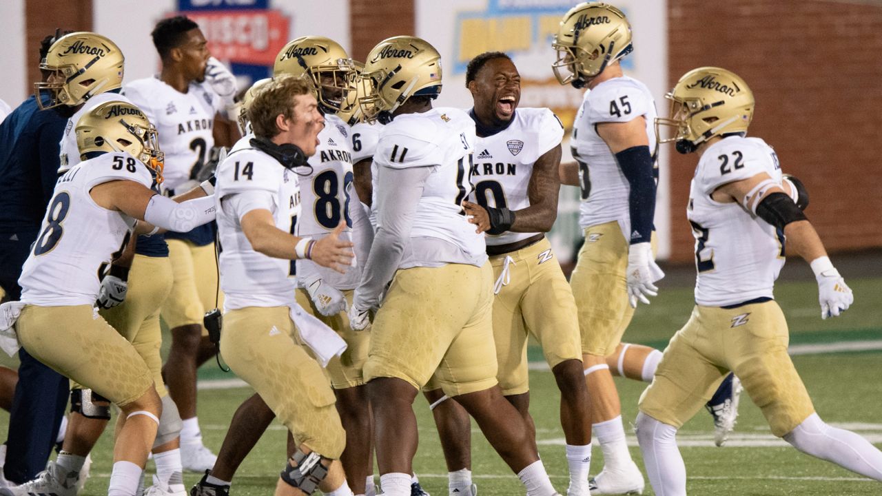 The Akron Zips celebrate a missed field goal during an NCAA football game against the Ohio Bobcats on Nov. 10, 2020 in Athens, Ohio.