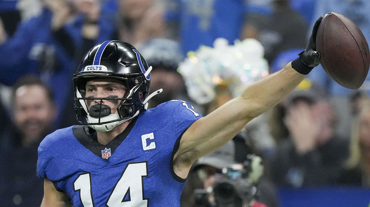 Indianapolis Colts wide receiver Alec Pierce (14) celebrates after making a catch during a game against the Detroit Lions at Lucas Oil Stadium.