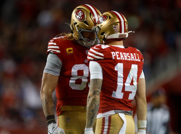 San Francisco 49ers' Ricky Pearsall (14) is congratulated on a catch by San Francisco 49ers' George Kittle (85) against the Detroit Lions in the third quarter at Levi's Stadium in Santa Clara, Calif., on Monday, Dec. 30, 2024. (Nhat V. Meyer/Bay Area News Group)