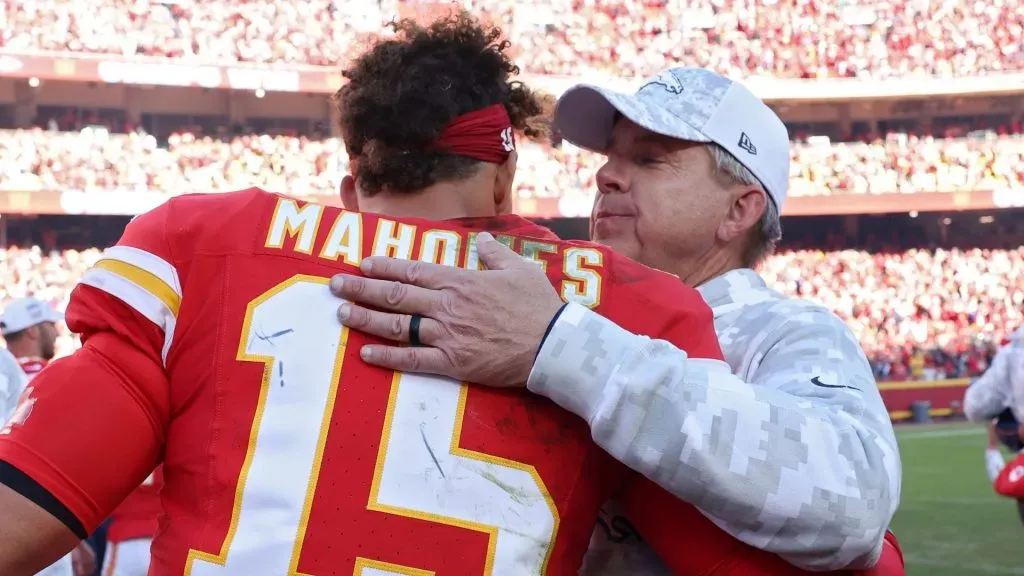 Patrick Mahomes #15 of the Kansas City Chiefs and head coach Sean Payton of the Denver Broncos hug after Kansas City's 16-14 win at GEHA Field at Arrowhead Stadium on November 10, 2024 in Kansas City, Missouri.