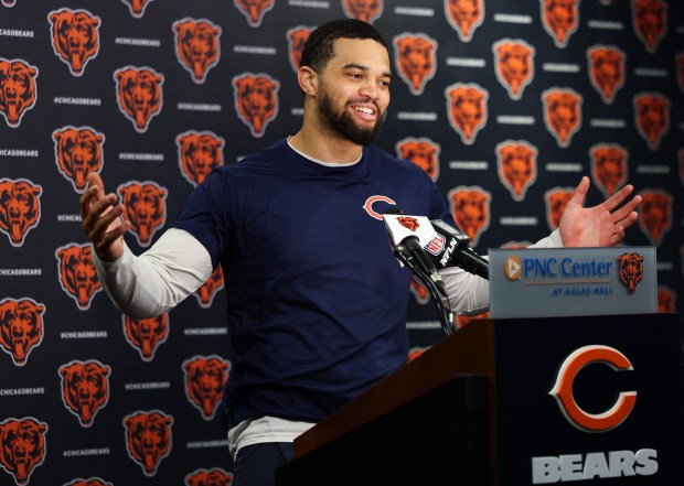 Bears quarterback Caleb Williams jokes with the media April 8, 2025, at Halas Hall about coach Ben Johnson's pop quiz during a meeting with the offense. (Stacey Wescott/Chicago Tribune)