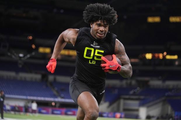 Alabama linebacker Jihaad Campbell runs a drill at the NFL combine in Indianapolis on Feb. 27, 2025. (AP Photo/Michael Conroy)