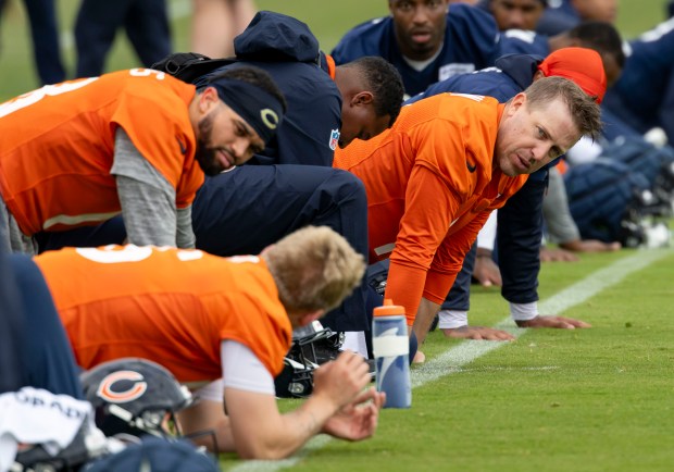 Bears quarterback Case Keenum stretches during practice Wednesday, May 28, 2025, at Halas Hall. (Brian Cassella/Chicago Tribune)