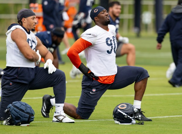 Bears defensive ends Daniel Hardy (92) and Dominique Robinson (90) practices Wednesday, May 28, 2025, at Halas Hall. (Brian Cassella/Chicago Tribune)