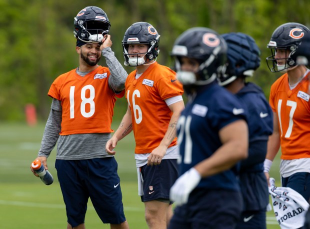 Bears quarterbacks Caleb Williams and Austin Reed (16) practice Wednesday, May 28, 2025, at Halas Hall. (Brian Cassella/Chicago Tribune)