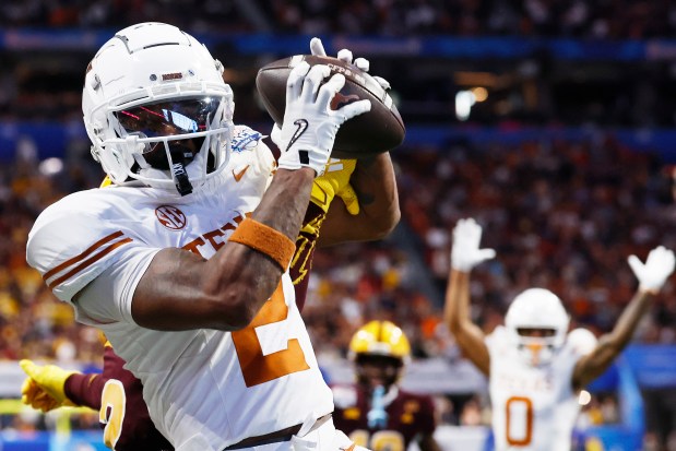 Texas' Matthew Golden catches a pass for a 2-point conversion during the second overtime against Arizona State in the Peach Bowl on Jan. 1, 2025, in Atlanta. (Butch Dill/Getty Images)