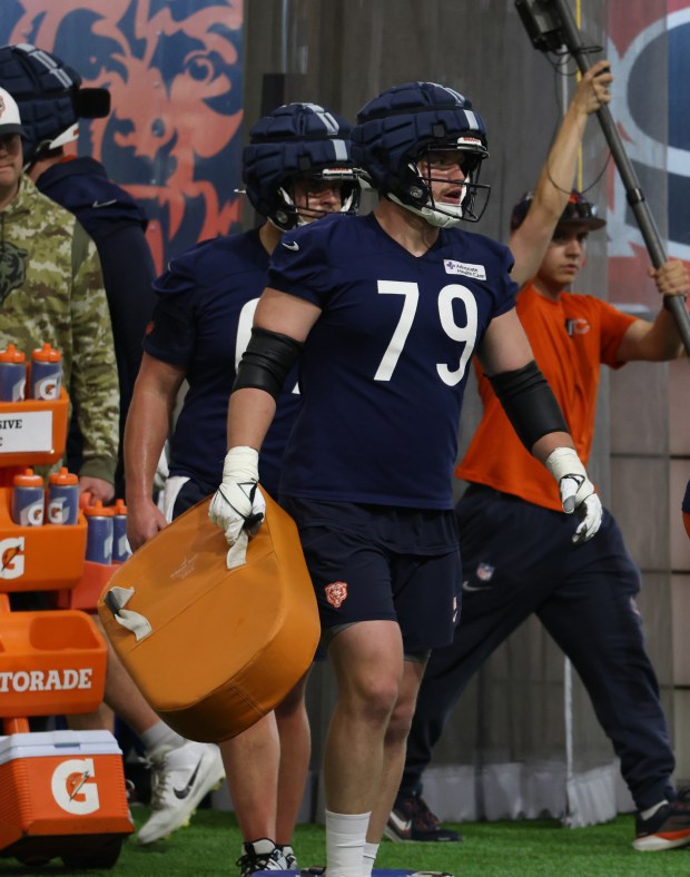 Theo Benedet works out during the Bears organized team activities in the Walter Payton Center at Halas Hall on May 21, 2025, in Lake Forest. (John J. Kim/Chicago Tribune)
