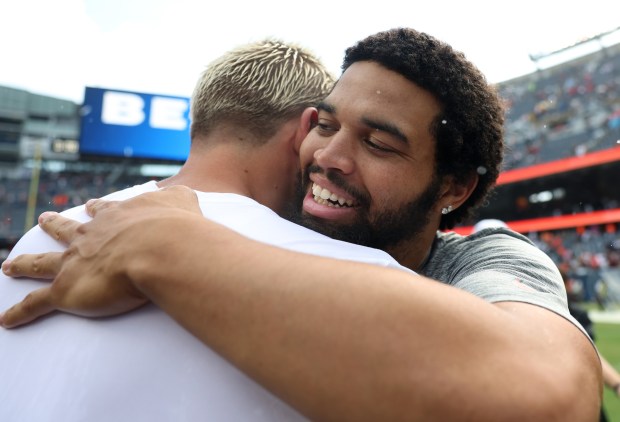 Bears quarterback Caleb Williams, right, greets Bengals quarterback Joe Burrow after a preseason game at Soldier Field on Aug. 17, 2024. (John J. Kim/Chicago Tribune)