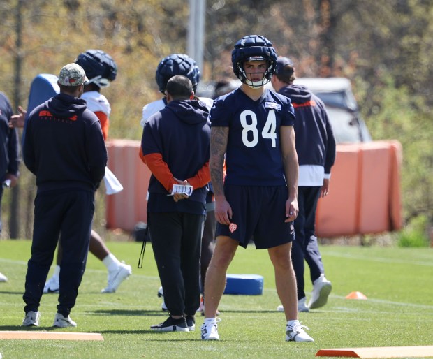 Rookie tight end Colston Loveland watches from the sidelines during Chicago Bears rookie camp at Halas Hall on May 9, 2025, in Lake Forest. Head coach Ben Johnson called Loveland "dinged up." (Stacey Wescott/Chicago Tribune)