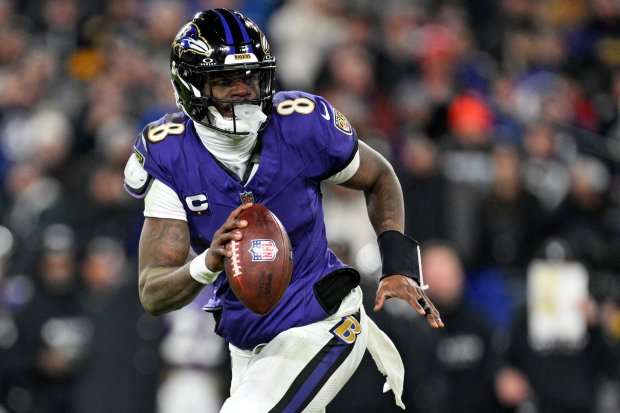 Ravens quarterback Lamar Jackson looks to pass during a playoff game against the Steelers on Jan. 11, 2025, in Baltimore. (AP Photo/Terrance Williams)