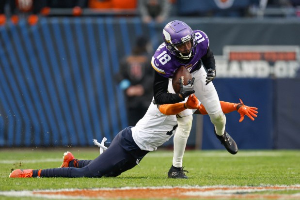 Vikings wide receiver Justin Jefferson breaks away from Bears cornerback Jaylon Johnson during overtime Nov. 24, 2024, at Soldier Field. (AP Photo/Kamil Krzaczynski)