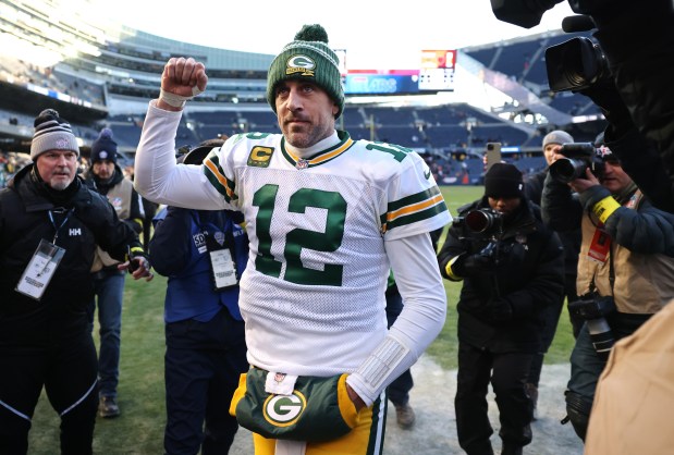 Packers quarterback Aaron Rodgers celebrates as he leaves the field after a victory over the Bears on Dec. 4, 2022, at Soldier Field. (Chris Sweda/Chicago Tribune)