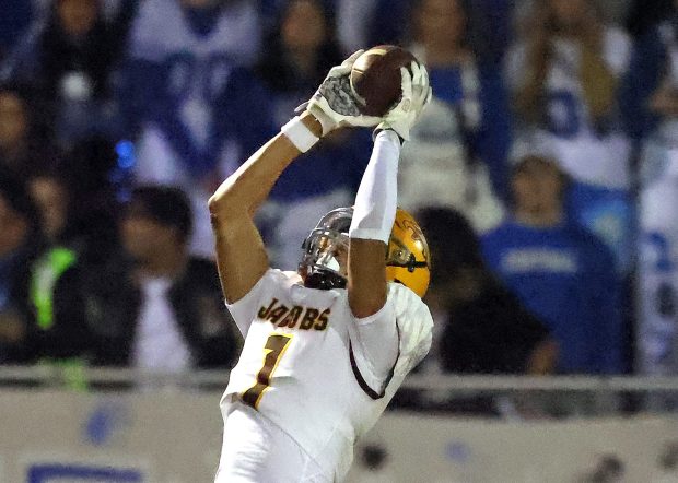 Former Jacobs tight end Nick True catches a pass against Burlington Central on Sept. 30, 2022, in Burlington. (H. Rick Bamman/For the Beacon-News)