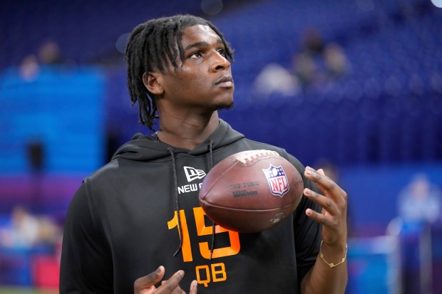 Miami quarterback Cam Ward watches a drill at the NFL combine March 1, 2025, in Indianapolis. (AP Photo/George Walker IV)