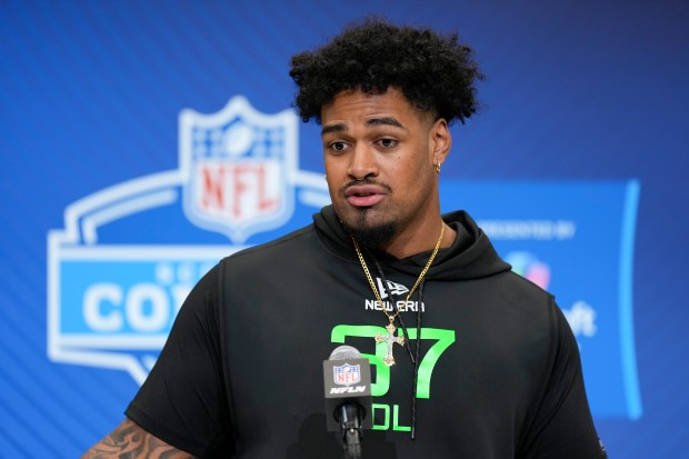 Ohio State offensive lineman Josh Simmons speaks during a news conference at the NFL combine March 1, 2025. (AP Photo/George Walker IV)