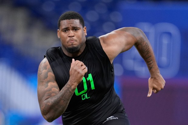 Texas offensive lineman Kelvin Banks Jr. runs a drill at the NFL combine on March 2, 2025. (AP Photo/George Walker IV)