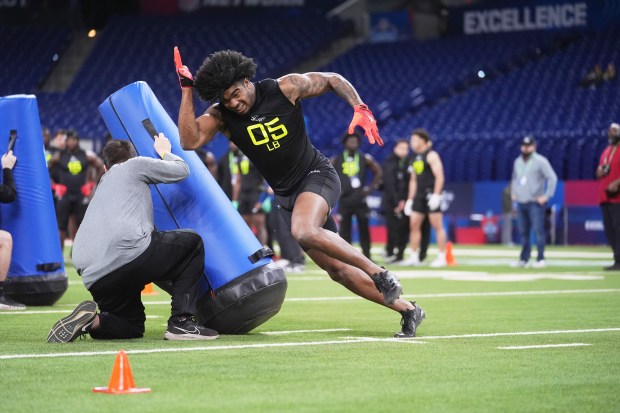 Alabama linebacker Jihaad Campbell runs a drill at the NFL combine Feb. 27, 2025, in Indianapolis. (AP Photo/Michael Conroy)