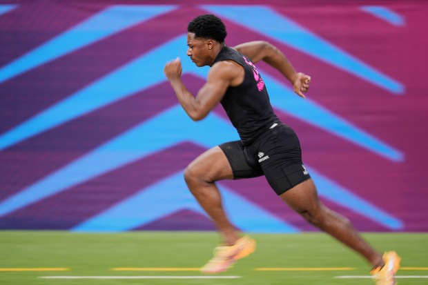 Colorado's Travis Hunter runs a drill at the NFL combine Feb. 28, 2025. (AP Photo/George Walker IV)