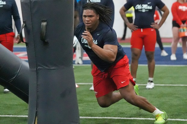 Mississippi defensive tackle Walter Nolen confronts a blocking dummy during a drill at the school's pro day on March 28, 2025, in Oxford, Miss. (AP Photo/Rogelio V. Solis)