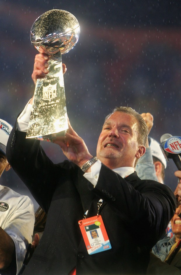 Colts owner Jim Irsay celebrates with the Vince Lombardi Super Bowl trophy after his team beat the Bears 29-17 in Super Bowl XLI on Feb. 4, 2007, at Dolphin Stadium in Miami Gardens, Fla. (Jed Jacobsohn/Getty Images)