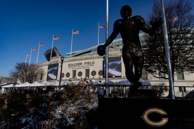 Soldier Field and the Walter Payton statue on Dec. 18,...
