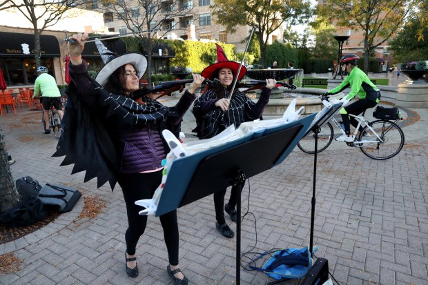 Twin sisters Desi Tchalukov, left, and Tedi Tsvetanska perform on...