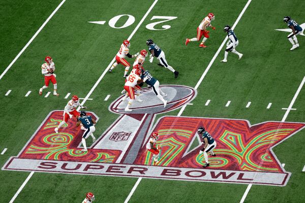 FILE - Kansas City Chiefs quarterback Patrick Mahomes (15) looks to pass the ball during the NFL Super Bowl 59 football game against the Philadelphia Eagles Sunday, Feb. 9, 2025, in New Orleans. The Eagles won 40-22. (AP Photo/Adam Hunger, File)