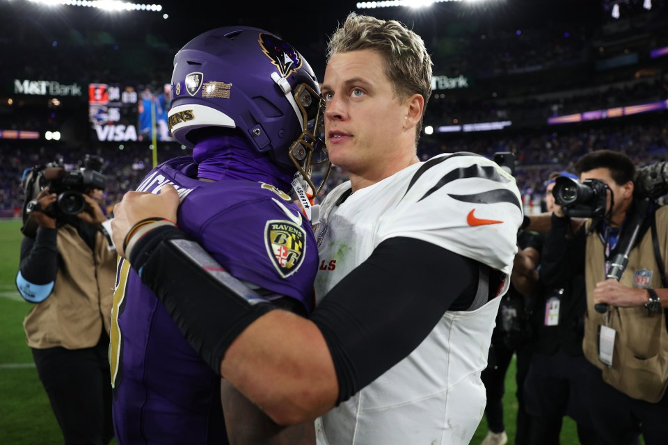 BALTIMORE, MARYLAND - NOVEMBER 07: Lamar Jackson #8 of the Baltimore Ravens and Joe Burrow #9 of the Cincinnati Bengals embrace following the game at M&T Bank Stadium on November 07, 2024 in Baltimore, Maryland. (Photo by Patrick Smith/Getty Images)