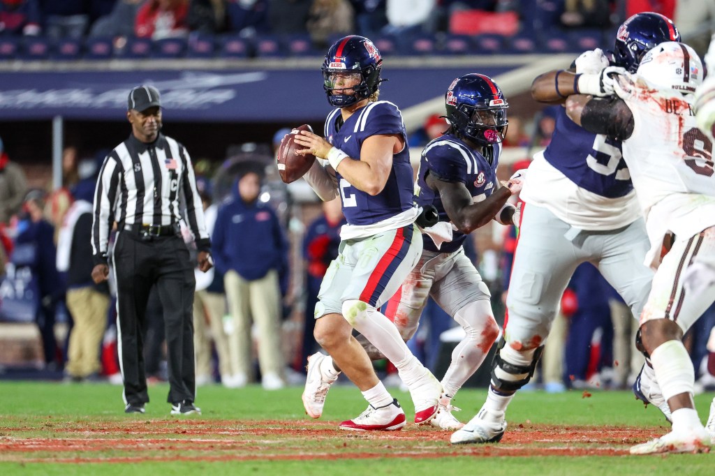 Ole Miss quarterback Jaxson Dart looks to pass against Mississippi State on Nov. 29, 2024.