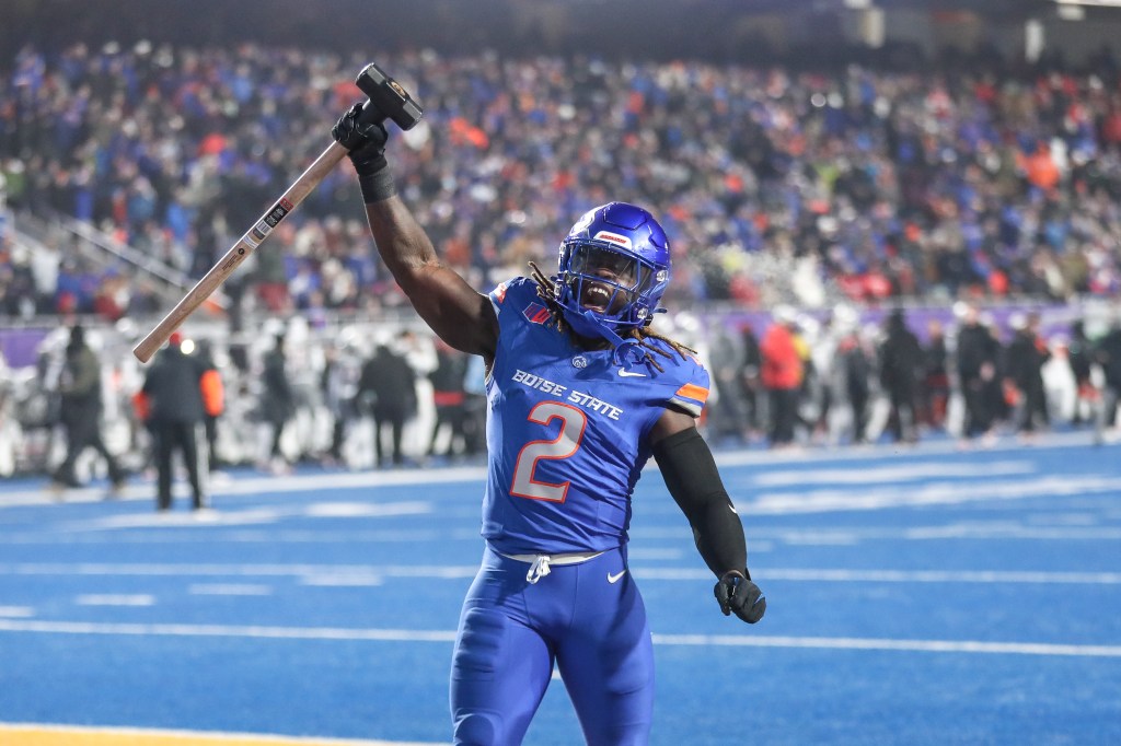 Running back Ashton Jeanty of the Boise State Broncos fires up the crowd prior to the start of the 2024 Mountain West Championship. 