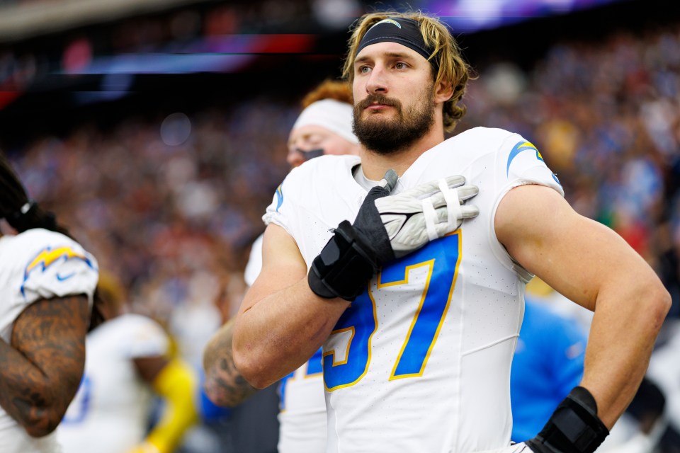 HOUSTON, TEXAS - JANUARY 11: Linebacker Joey Bosa #97 of the Los Angeles Chargers stands on the sidelines during the national anthem prior to an AFC Wild Card game against the Houston Texans at NRG Stadium on January 11, 2025 in Houston, Texas. (Photo by Brooke Sutton/Getty Images)