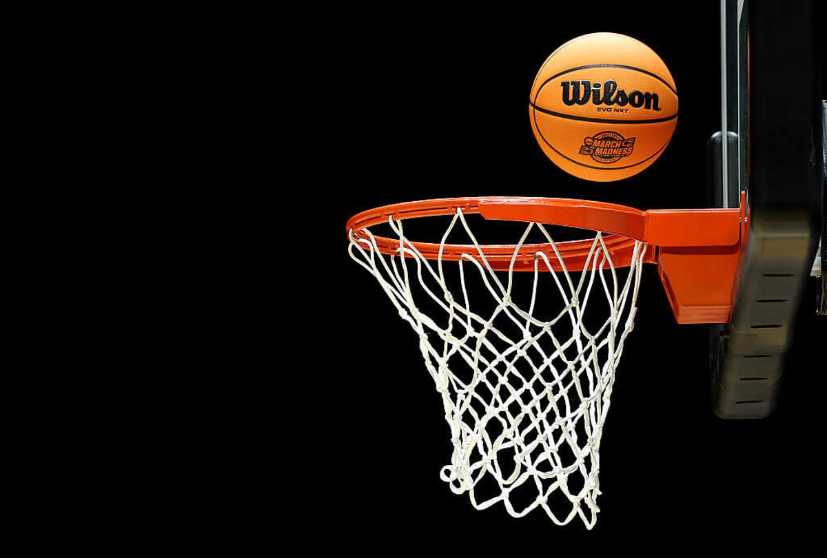 College basketball considering coach’s challenge, whether to use quarters for men