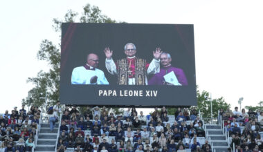 A screen flashes the news of new Pope Leo XIV, during the second round match between Italys' Fabio ...