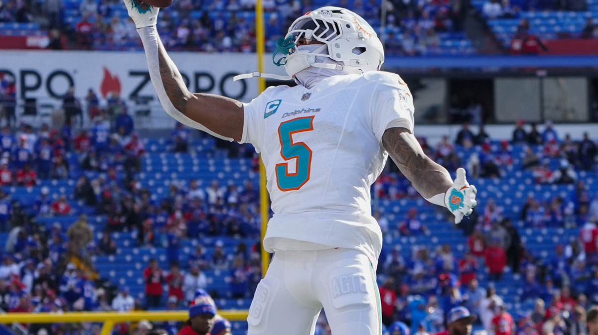 Miami Dolphins cornerback Jalen Ramsey (5) warms up prior to the game at Highmark Stadium. 