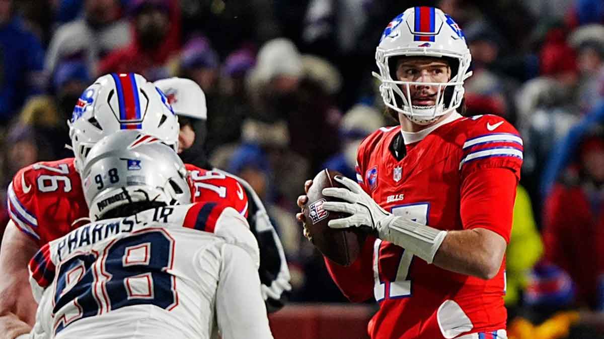 Buffalo Bills quarterback Josh Allen (17) looks for an open receiver during second half action at Highmark Stadium where the Buffalo Bills hosted the New England Patriots in Orchard Park on Dec. 22, 2024.