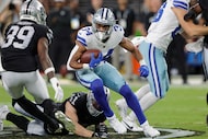 Dallas Cowboys running back Malik Davis (34) runs against the Las Vegas Raiders during the...