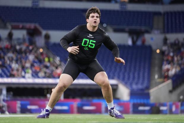 LSU offensive lineman Will Campbell runs a drill at the NFL combine in Indianapolis on March 2, 2025. (AP Photo/Michael Conroy)