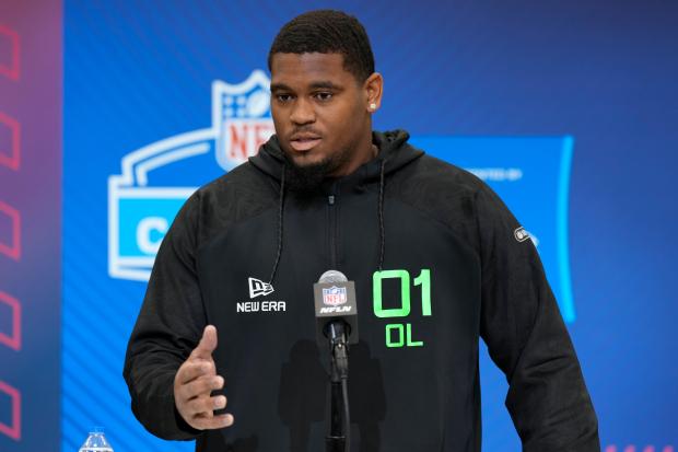 Texas offensive lineman Kelvin Banks Jr. speaks during a news conference at the NFL combine on March 1, 2025, in Indianapolis. (AP Photo/George Walker IV)