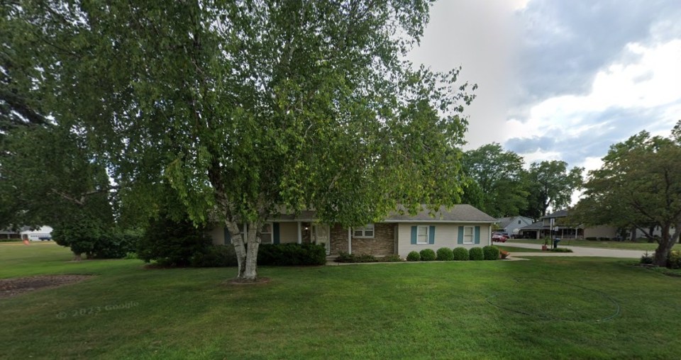House next to a sports stadium.