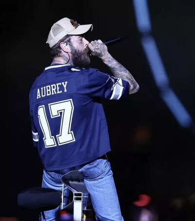 Post Malone sparks debate after wearing Brandon Aubrey’s jersey at Cowboys concert