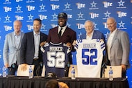 (From left) Dallas Cowboys Chief Sales and Marketing Officer Jerry Jones Jr., head coach...