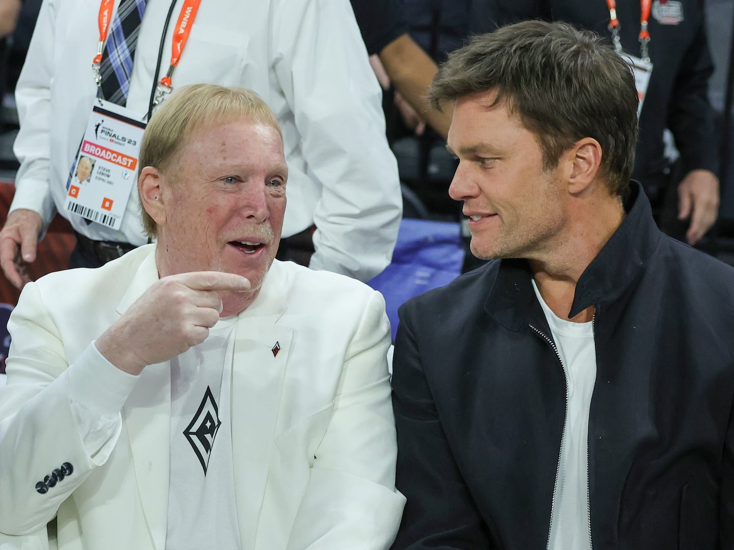 Raiders owner Mark Davis (left) said Tom Brady will be crucial in finding the team's next quarterback, but Brady didn't have much to say about Sheuder Sanders.